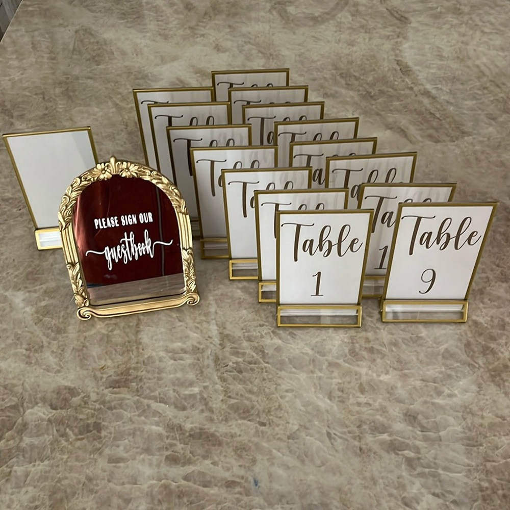 Table numbers and guest book mirror sign